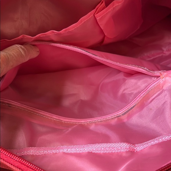 Red and Brown Travel Bag with Adjustable Strap and Sturdy Design - Picture 10 of 10